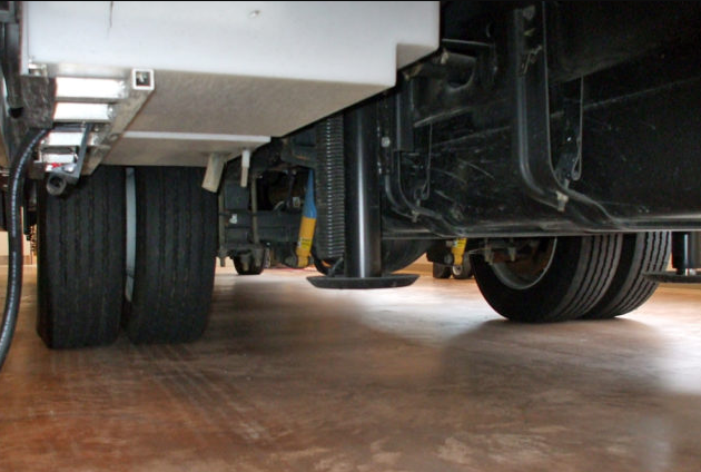 RV leveling jack being repaired on-site in Stuart, Florida